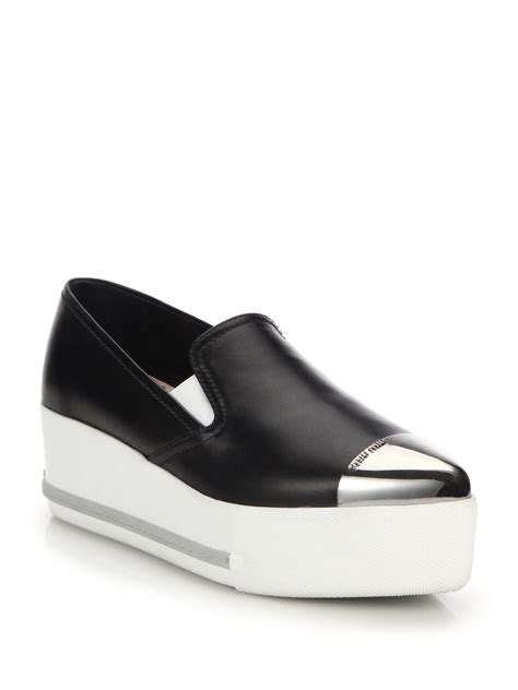 miu miu black toe cap platform slip on sneakers|Miu Miu Cap.